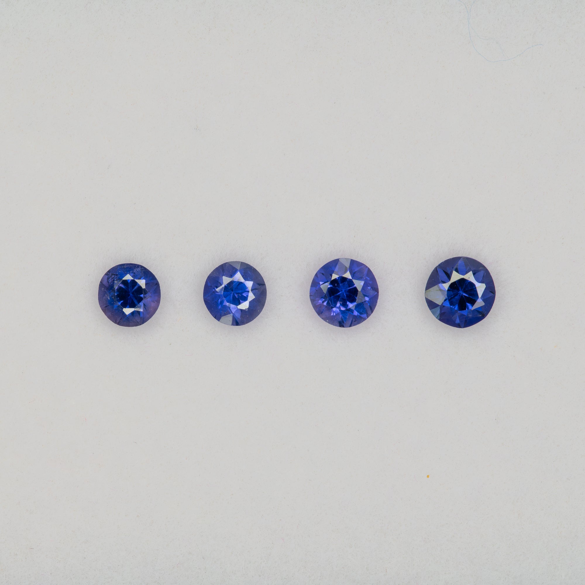 0.20 carat natural blue and purple sapphire, round 3.5mm loose gemstone