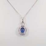 14K white gold tanzanite pendant