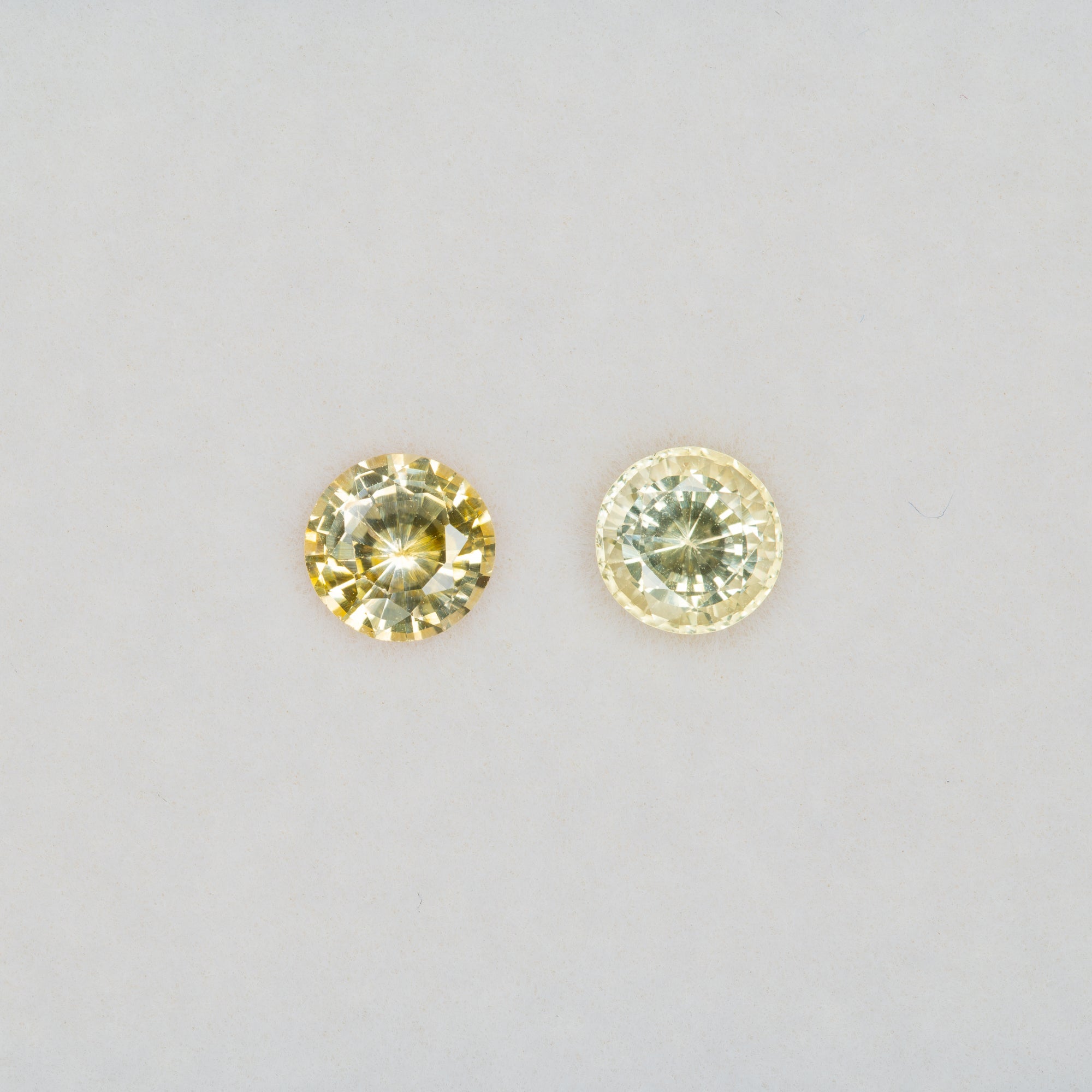 0.69 carat natural canary sapphire, round 5.2mm loose yellow gemstone