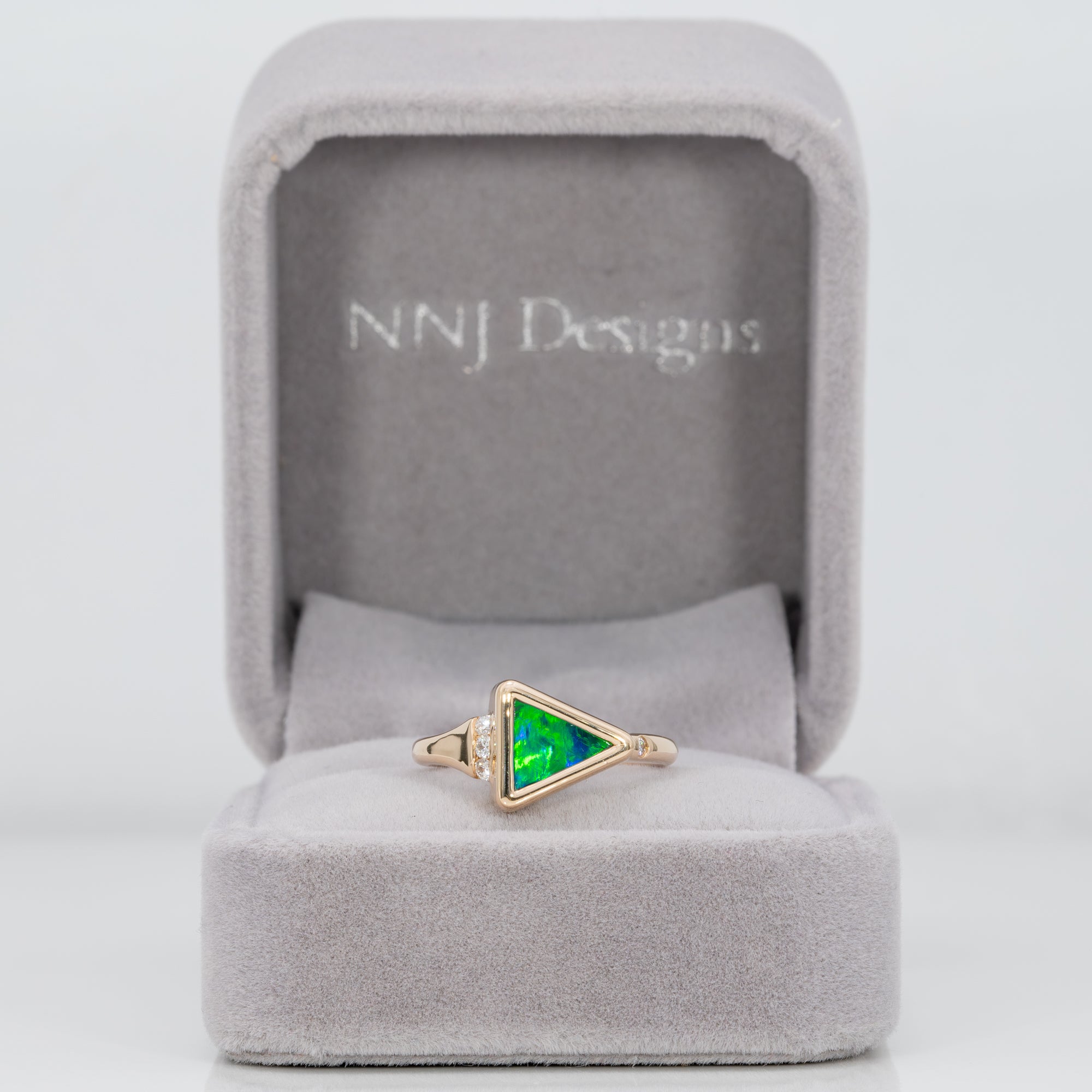 14K yellow gold boulder opal ring with diamond accents