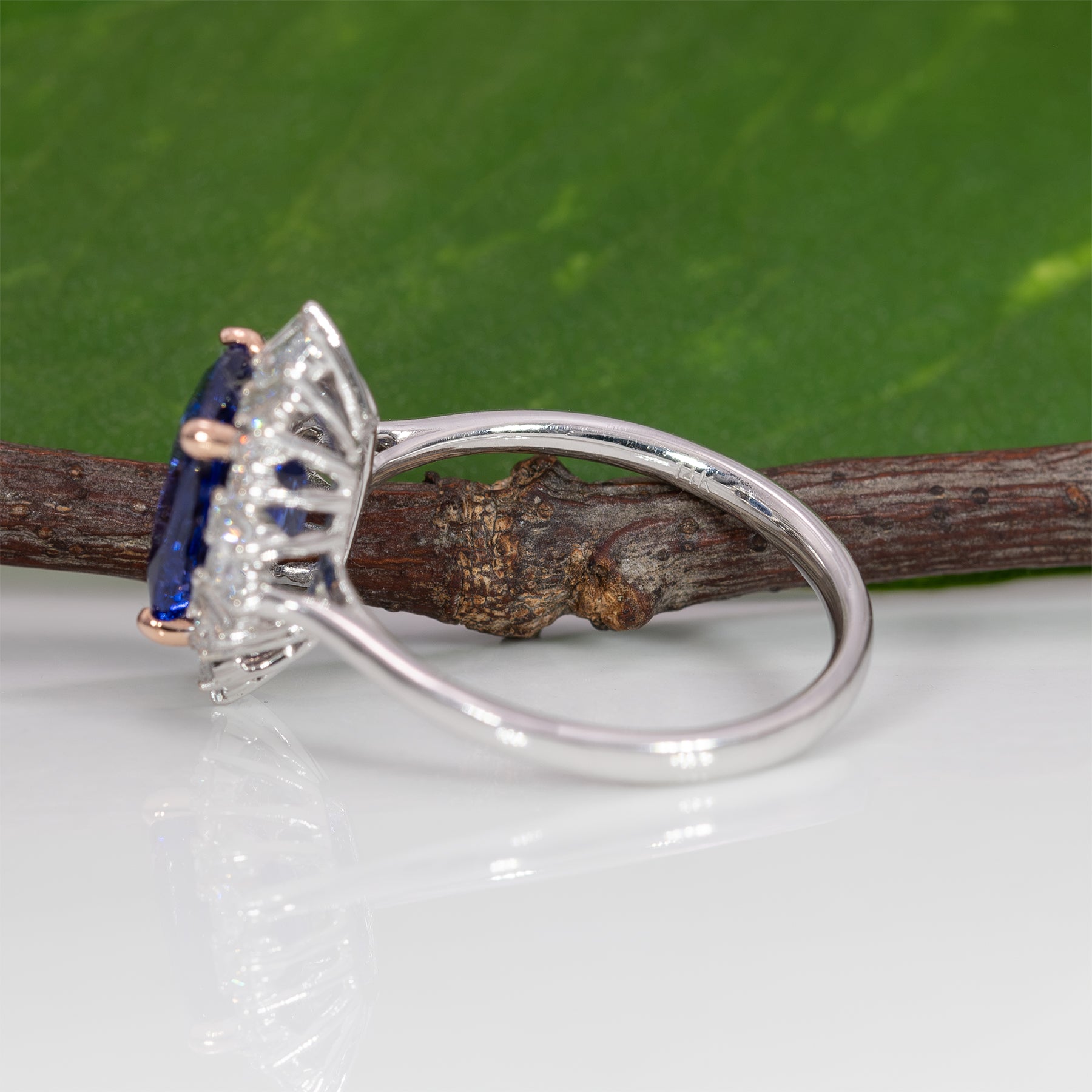 14K white and rose gold tanzanite ring with diamond accents