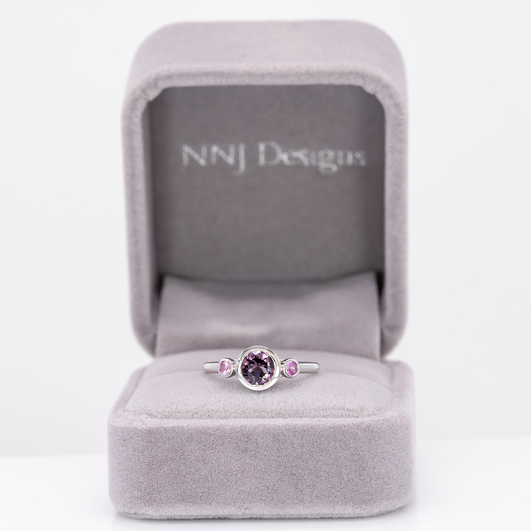 14K white gold purple spinel ring with purple sapphire accents