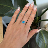 14K white gold Cambodian blue zircon cushion ring with diamond accents