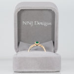 14K yellow gold colombian emerald ring with diamond accents
