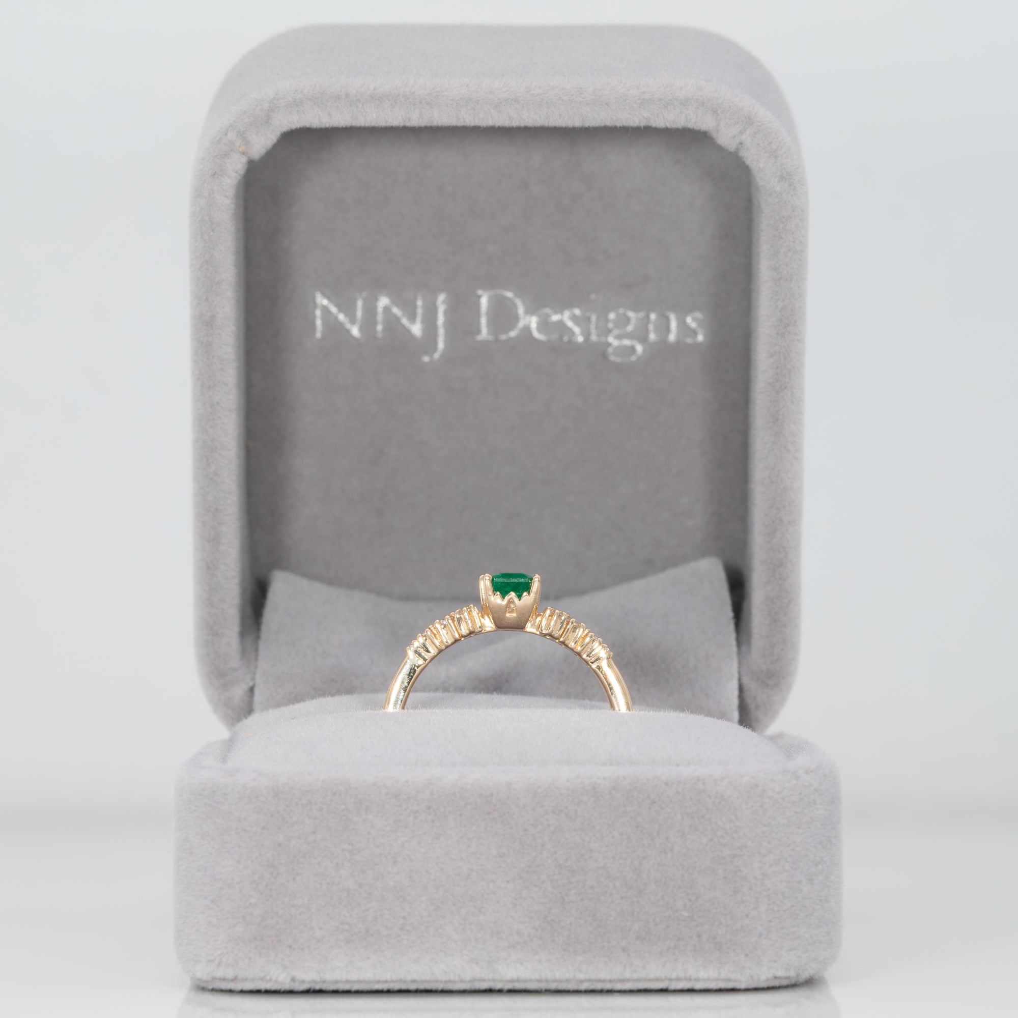 14K yellow gold colombian emerald ring with diamond accents