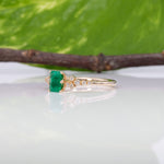 14K yellow gold colombian emerald ring with diamond accents