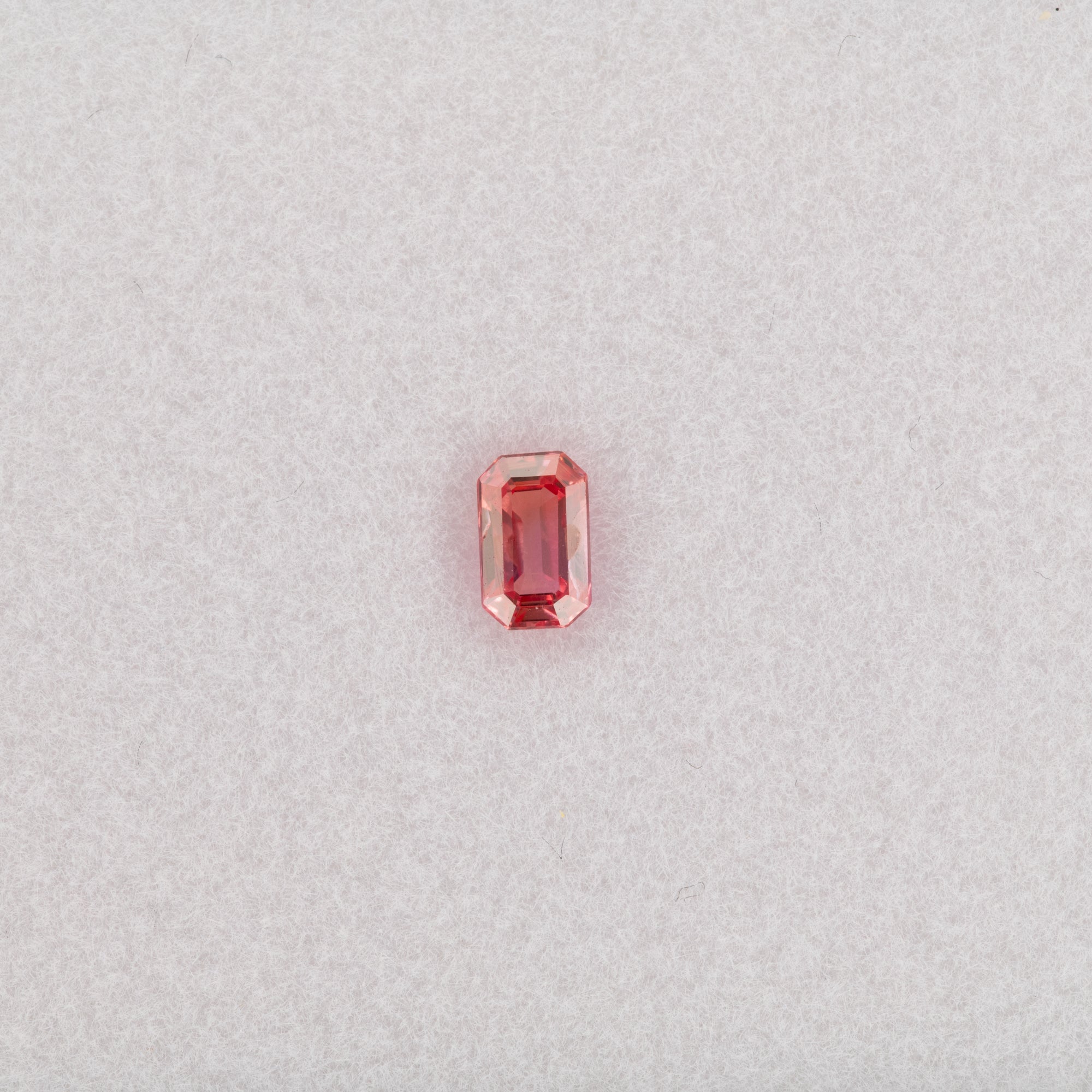 0.34 carat natural padparadscha sapphire, emerald cut 5x3.1mm pink-orange loose gemstone