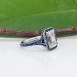 platinum lab grown diamond ring with blue sapphire accents