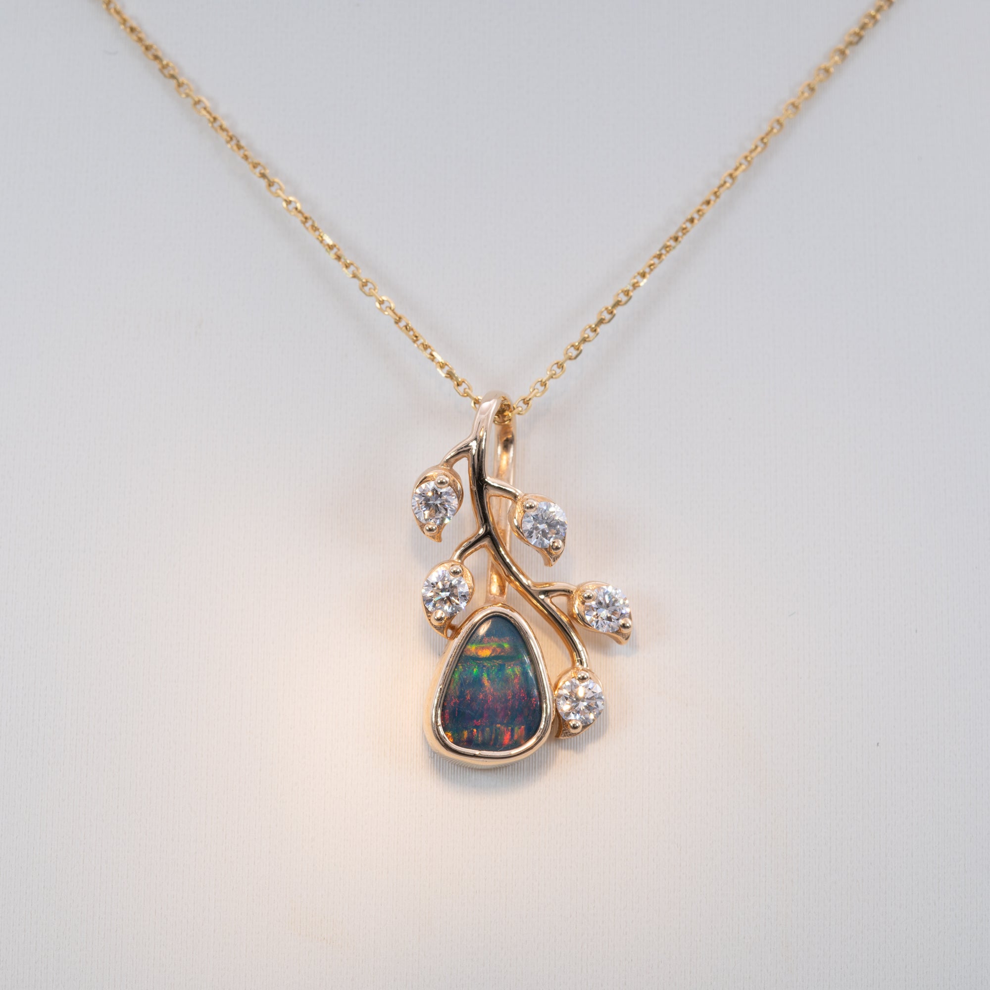 14K yellow gold boulder opal pendant