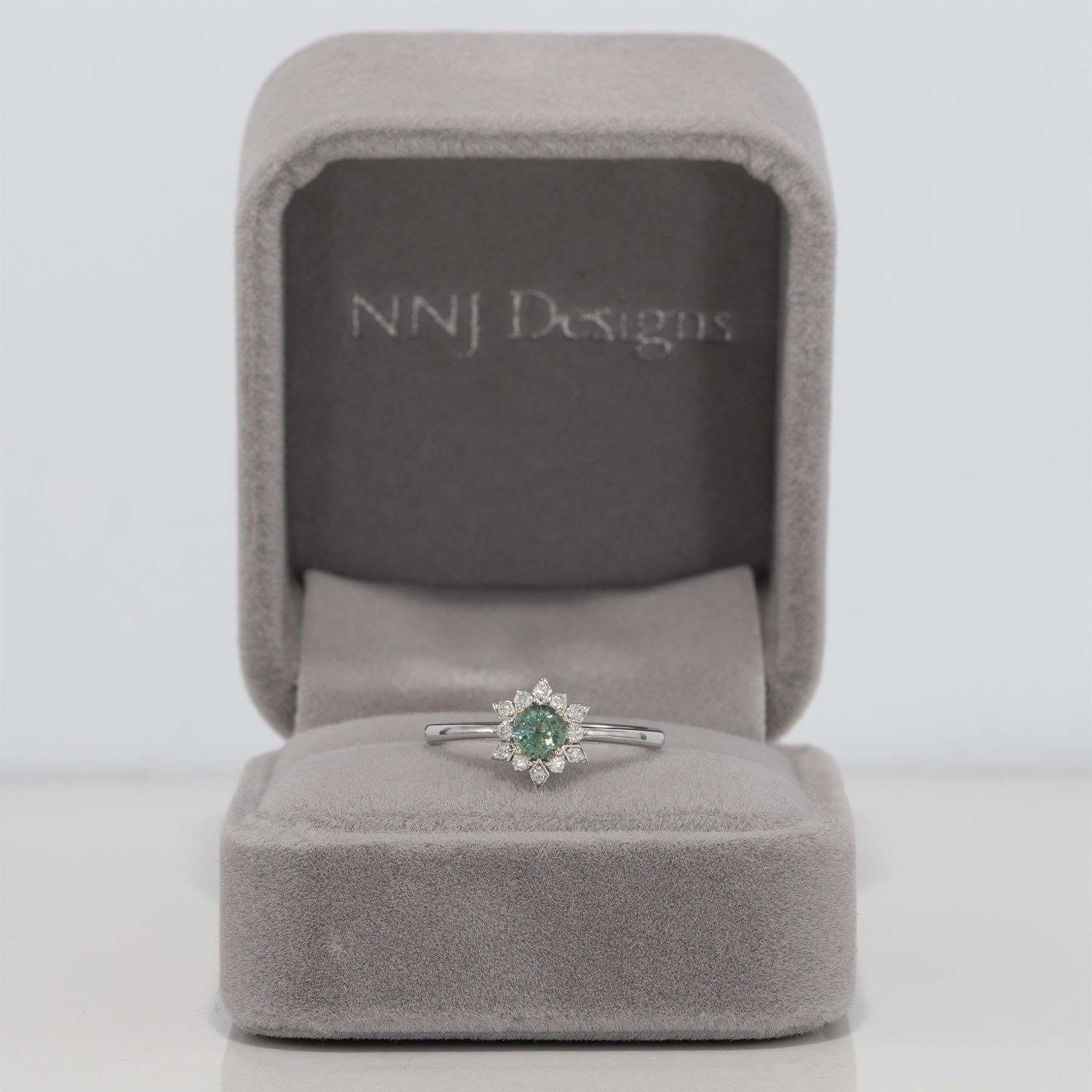 14K white gold alexandrite ring with diamond accents