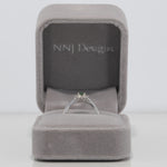 14K white gold alexandrite ring with diamond accents