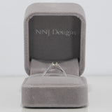 14K white gold alexandrite ring with diamond accents