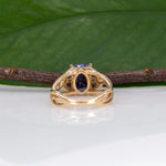 14K yellow gold cushion tanzanite ring with diamond accents