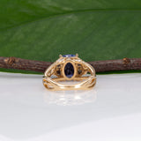 14K yellow gold cushion tanzanite ring with diamond accents