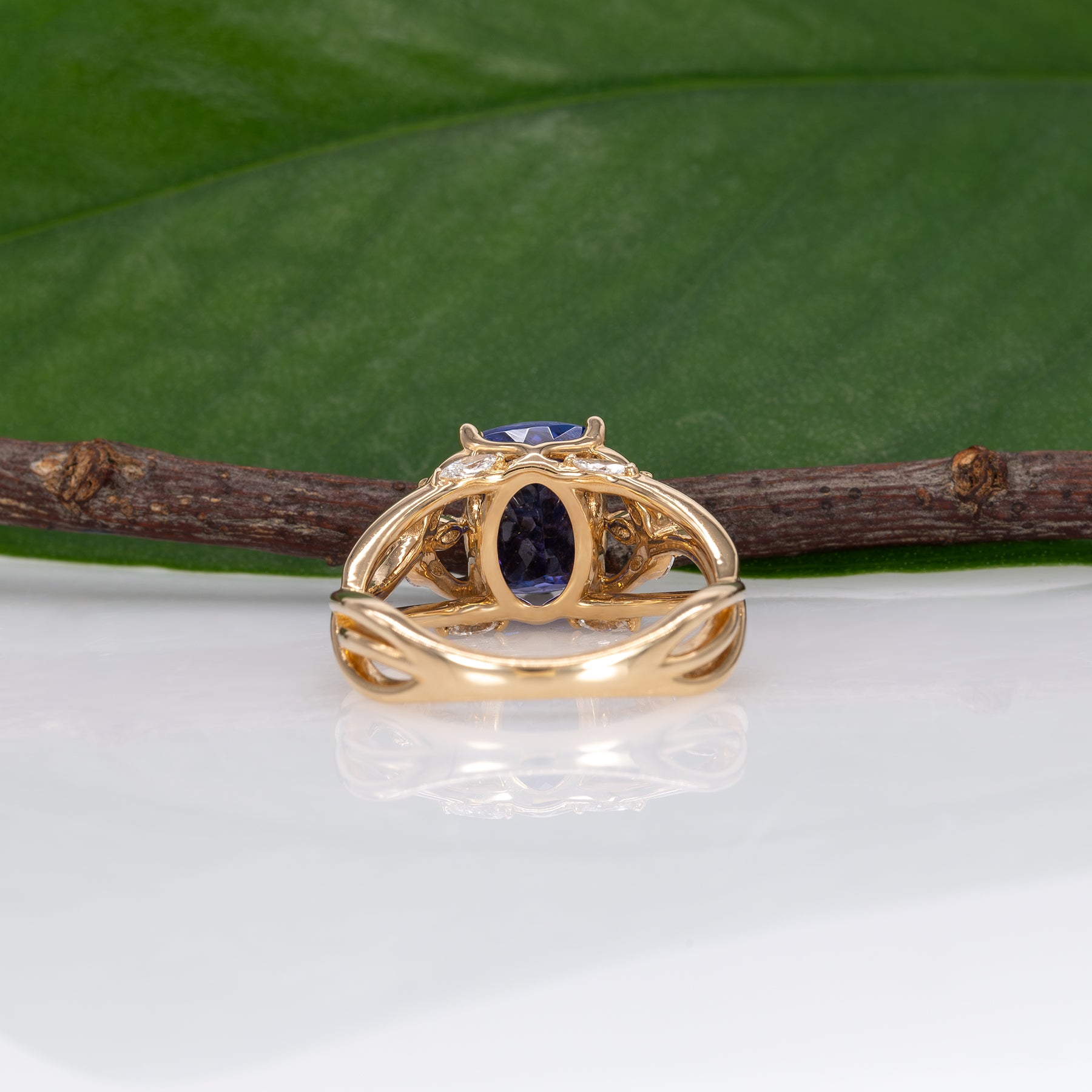 14K yellow gold cushion tanzanite ring with diamond accents