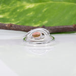 14K white gold padparadscha sapphire ring with diamond accents