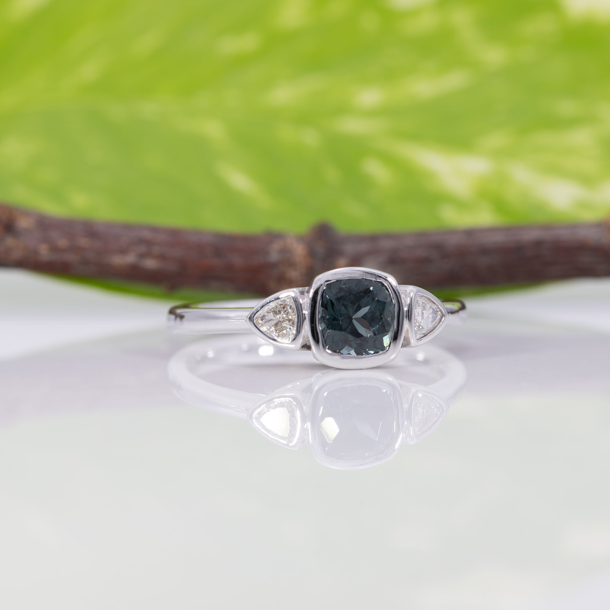 14K white gold blue spinel ring with diamond accents