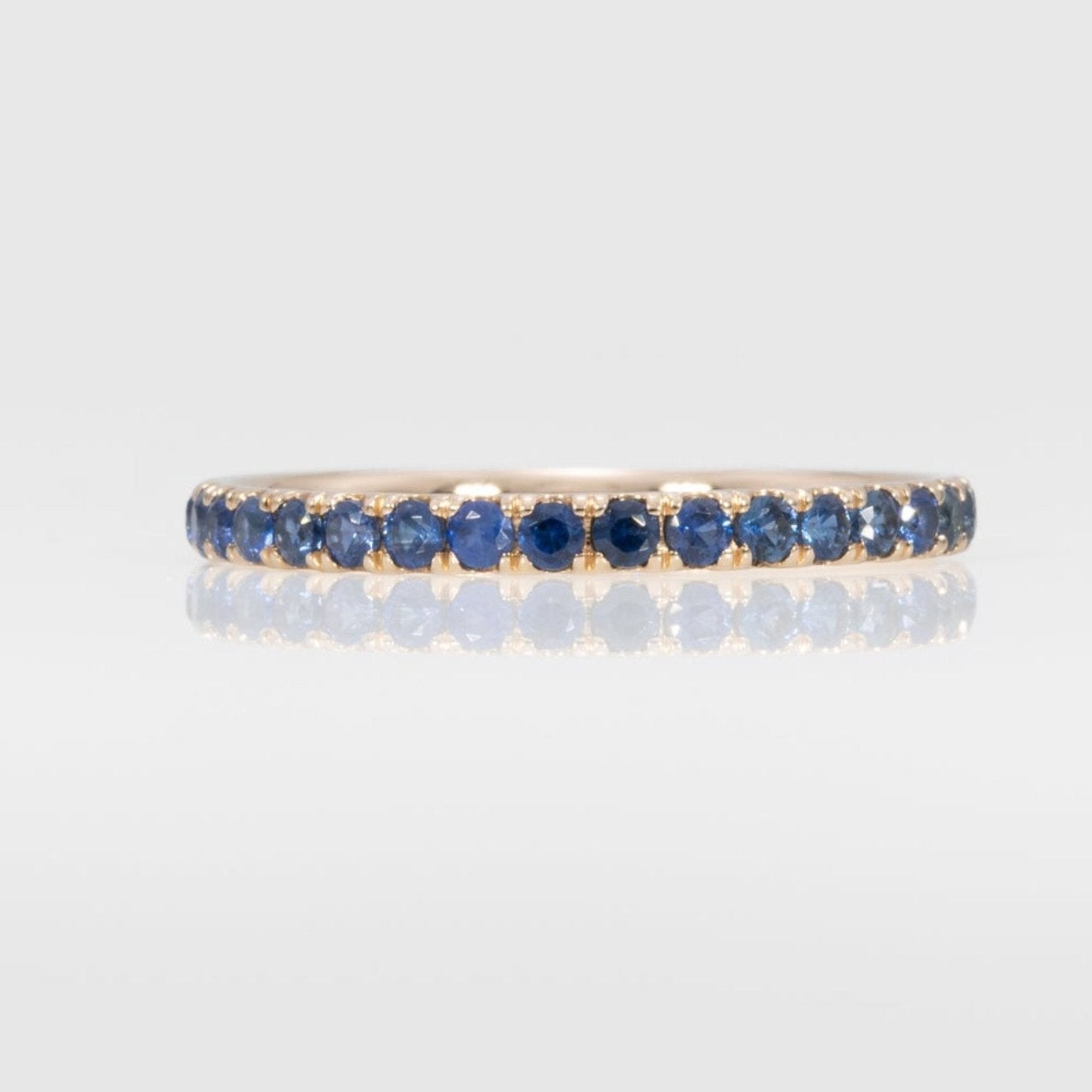 14K yellow gold blue sapphire band