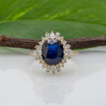 14K yellow gold GIA Ceylon sapphire cushion ring with diamond halo