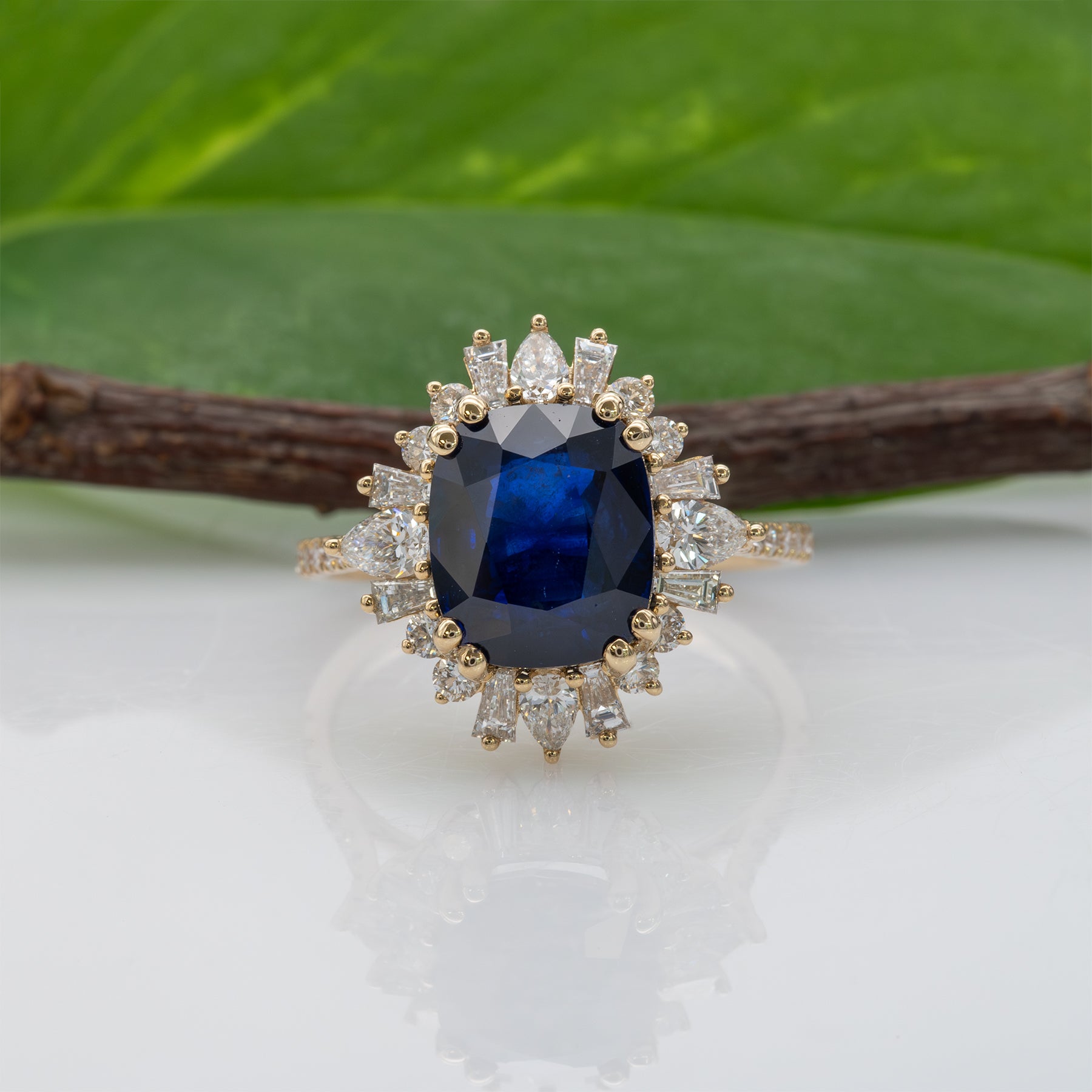 14K yellow gold GIA Ceylon sapphire cushion ring with diamond halo