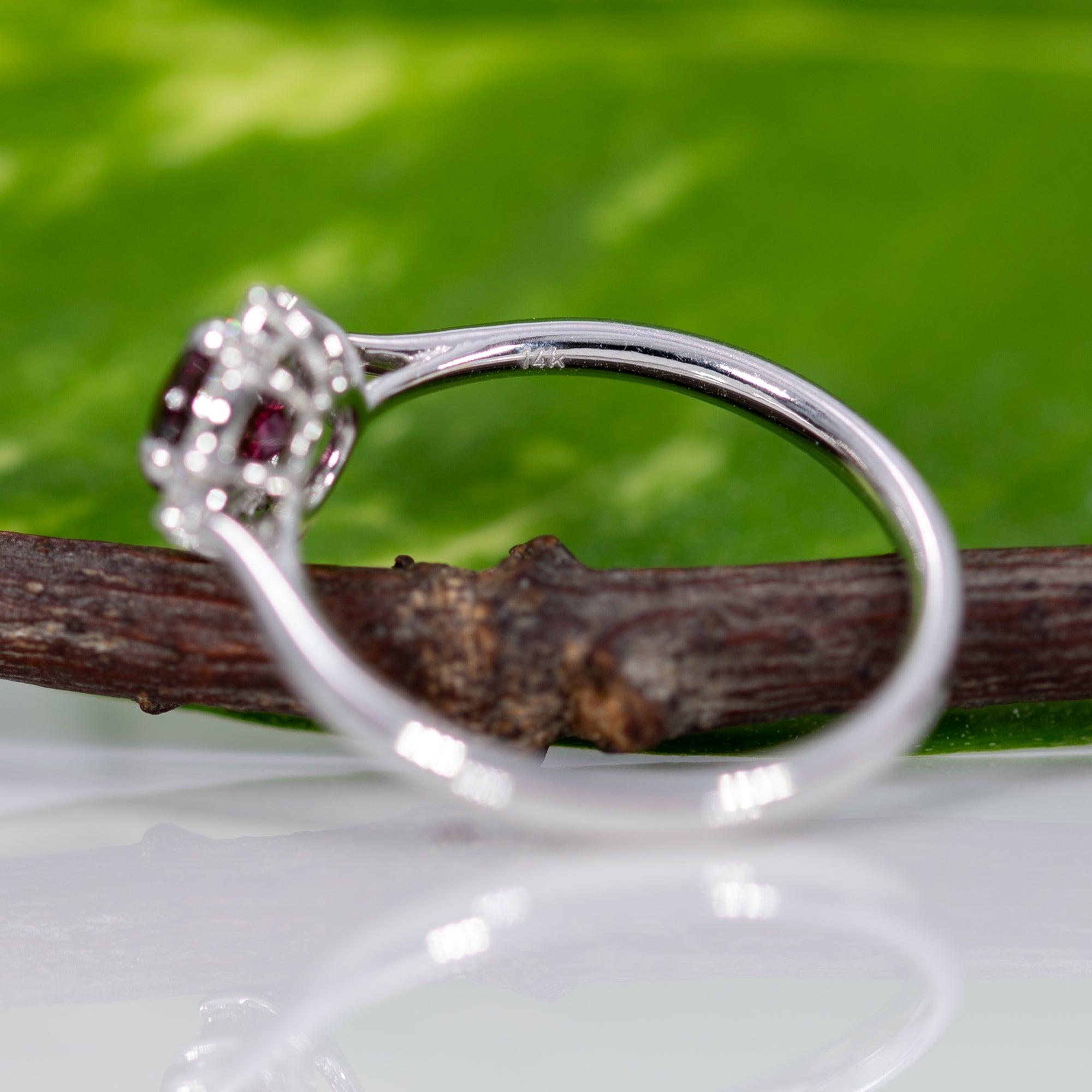14K white gold red spinel ring with diamond halo
