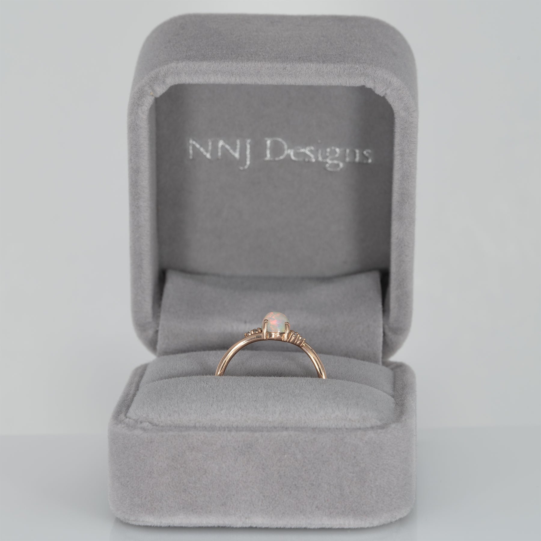 14K rose gold Ethiopian opal cabochon ring with diamond accents