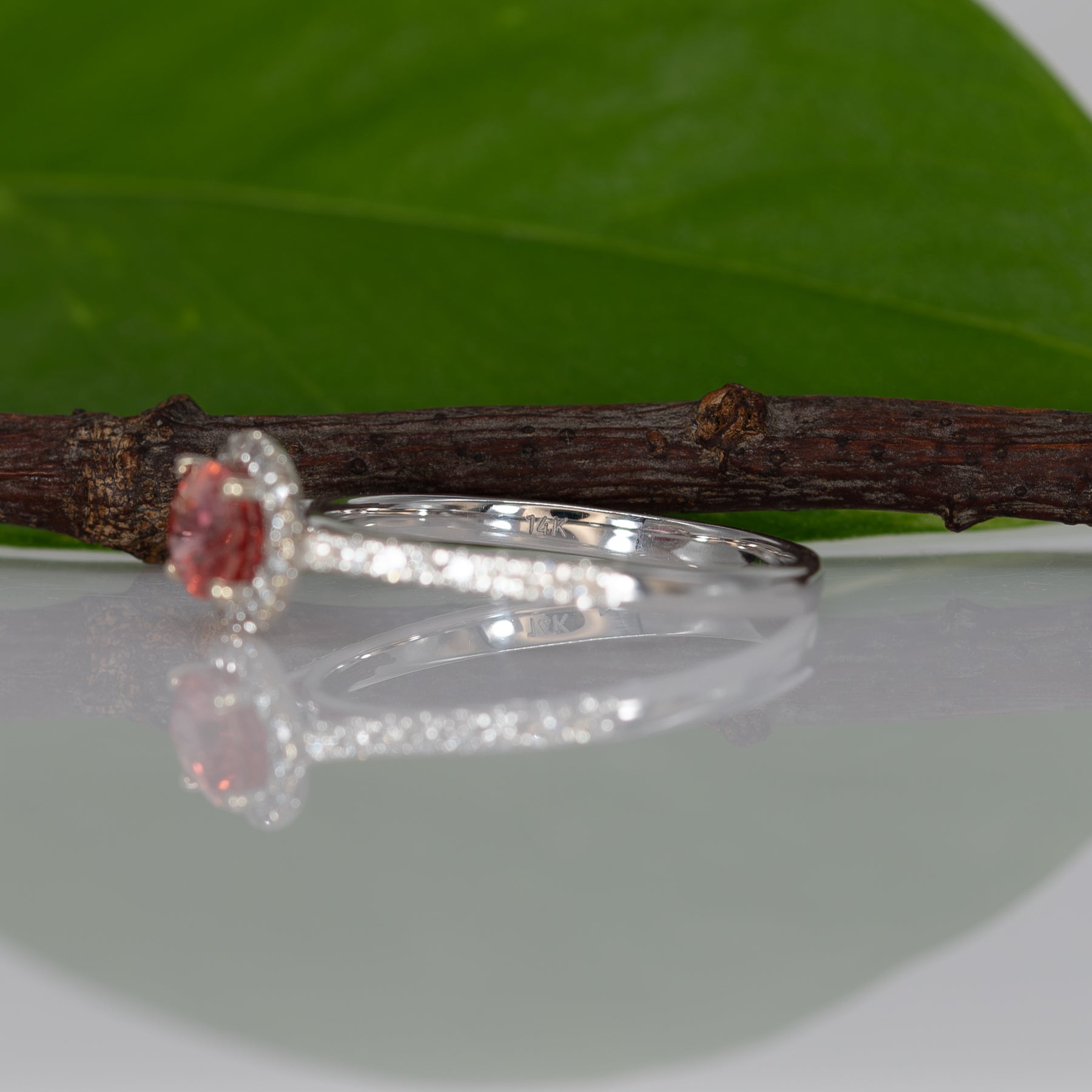 14K white gold padparadscha sapphire oval ring with diamond halo