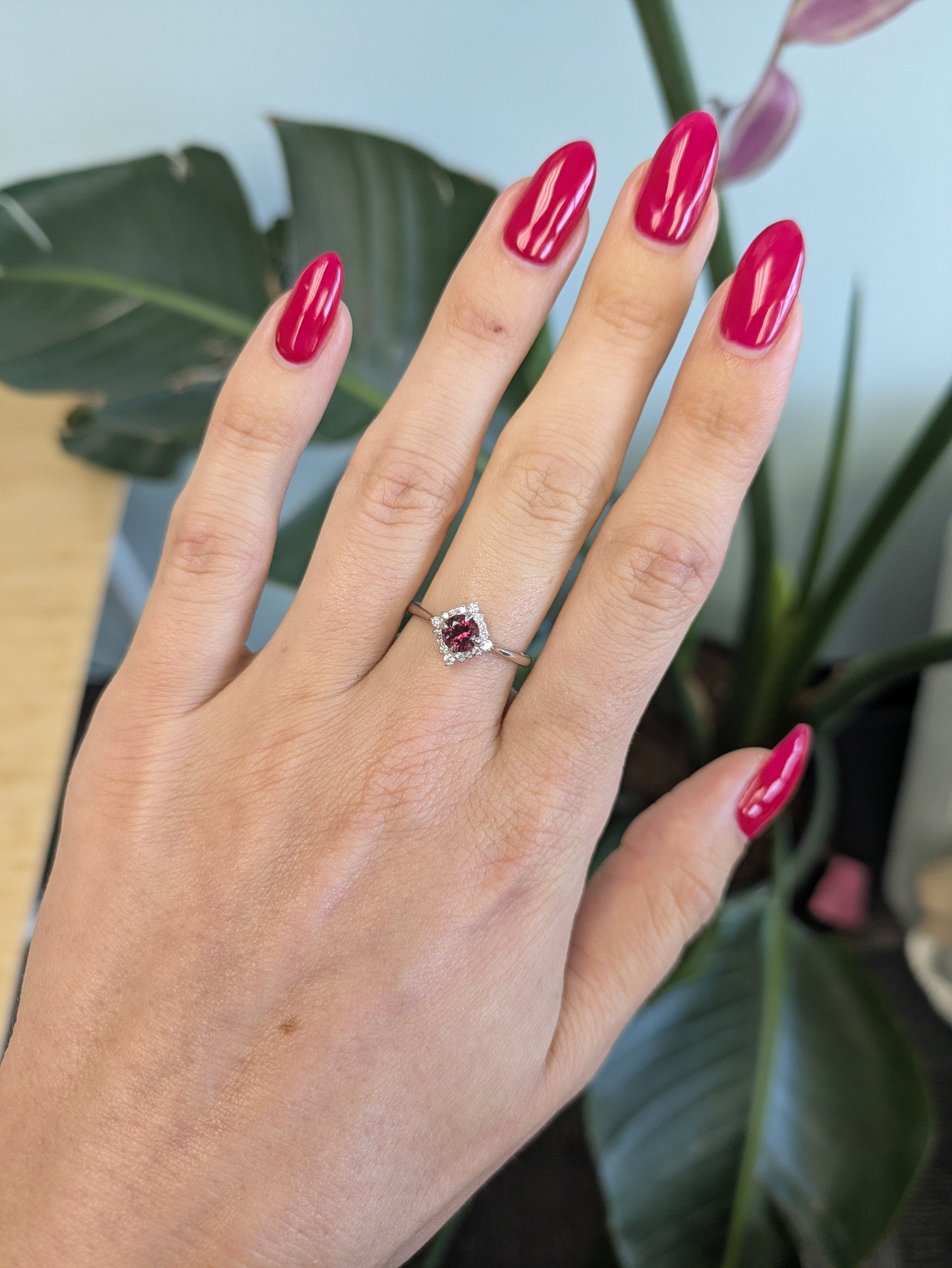 14K white gold red spinel ring with diamond halo