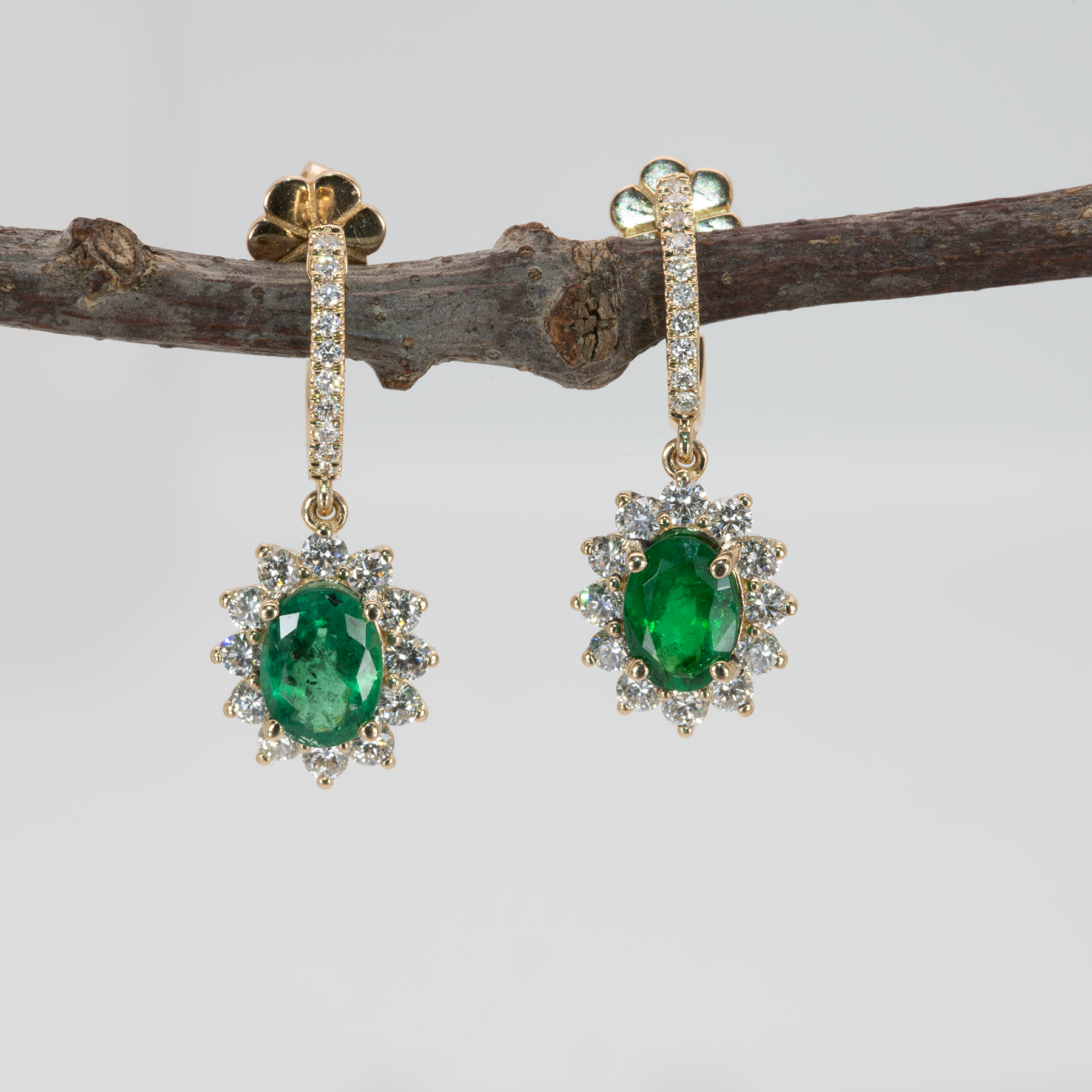 Emerald Stud Earrings in 14K Yellow Gold | Diamond Accents | Oval Cut | 7x5mm | May Birthstone
