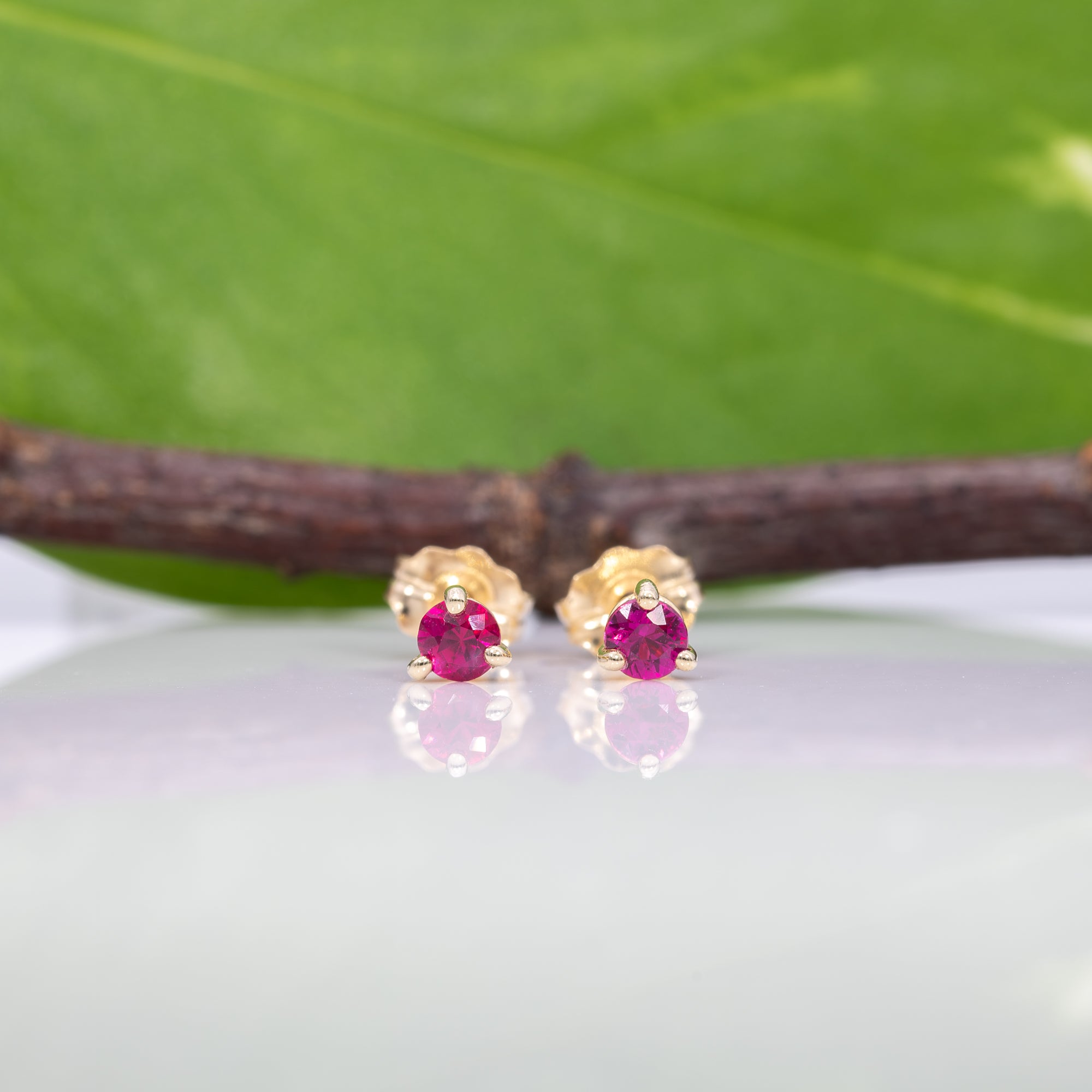 14K yellow gold mozambique ruby earrings