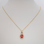14K yellow gold padparadscha sapphire pendant
