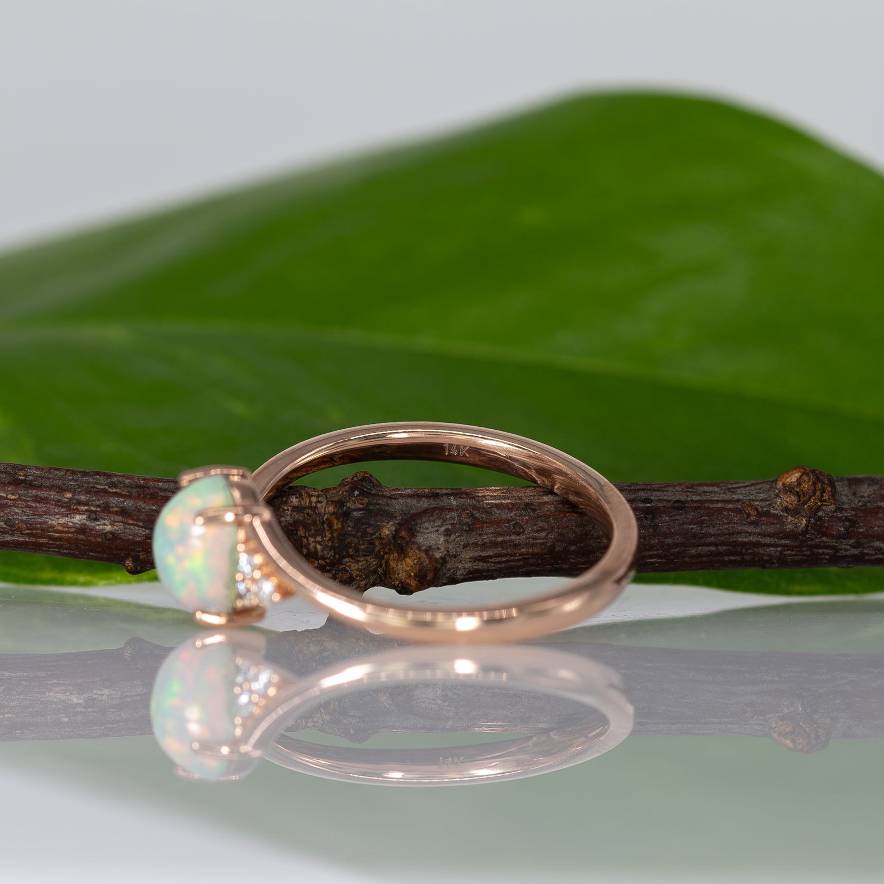 14K rose gold Ethiopian opal cabochon ring with diamond accents