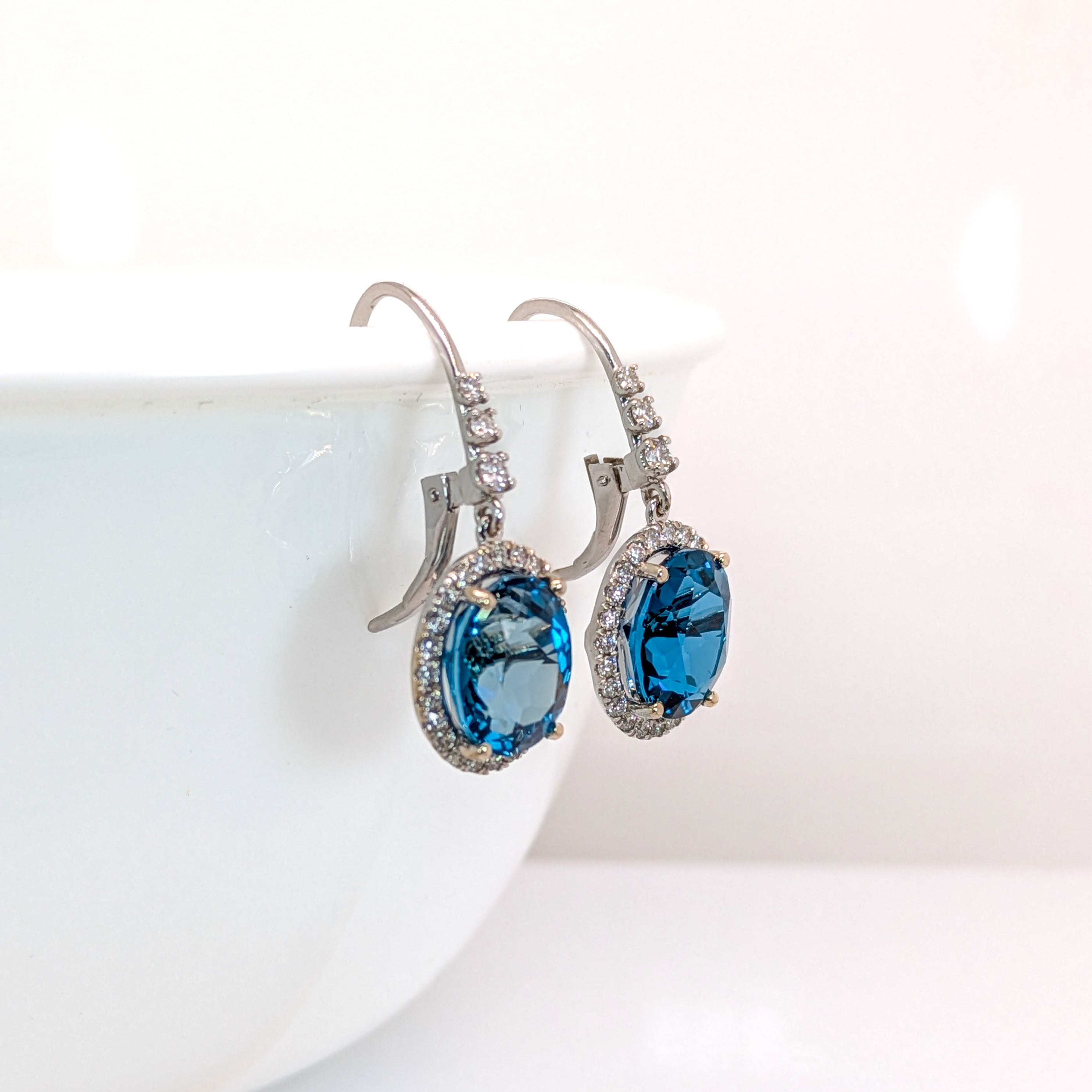 London Blue Topaz Stud Earrings in 14K White Gold | Diamond Accents | Oval Cut | 11x9mm | November Birthstone
