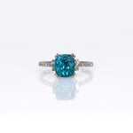 14K white gold Cambodian blue zircon cushion ring with diamond accents