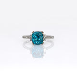 14K white gold Cambodian blue zircon cushion ring with diamond accents