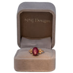 14K rose gold star ruby cabochon ring with diamond accents