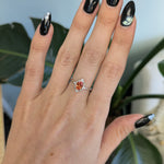 14K white gold padparadscha sapphire ring with diamond halo
