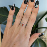 14K white gold padparadscha sapphire ring with diamond halo