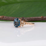 14K rose gold London blue topaz ring with diamond accents