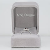 14K white gold red spinel ring with diamond halo