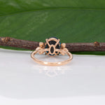 14K rose gold London blue topaz ring with diamond accents