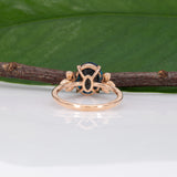 14K rose gold London blue topaz ring with diamond accents
