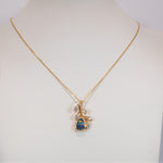 14K yellow gold boulder opal pendant