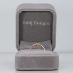 14K rose gold alexandrite ring with diamond accents