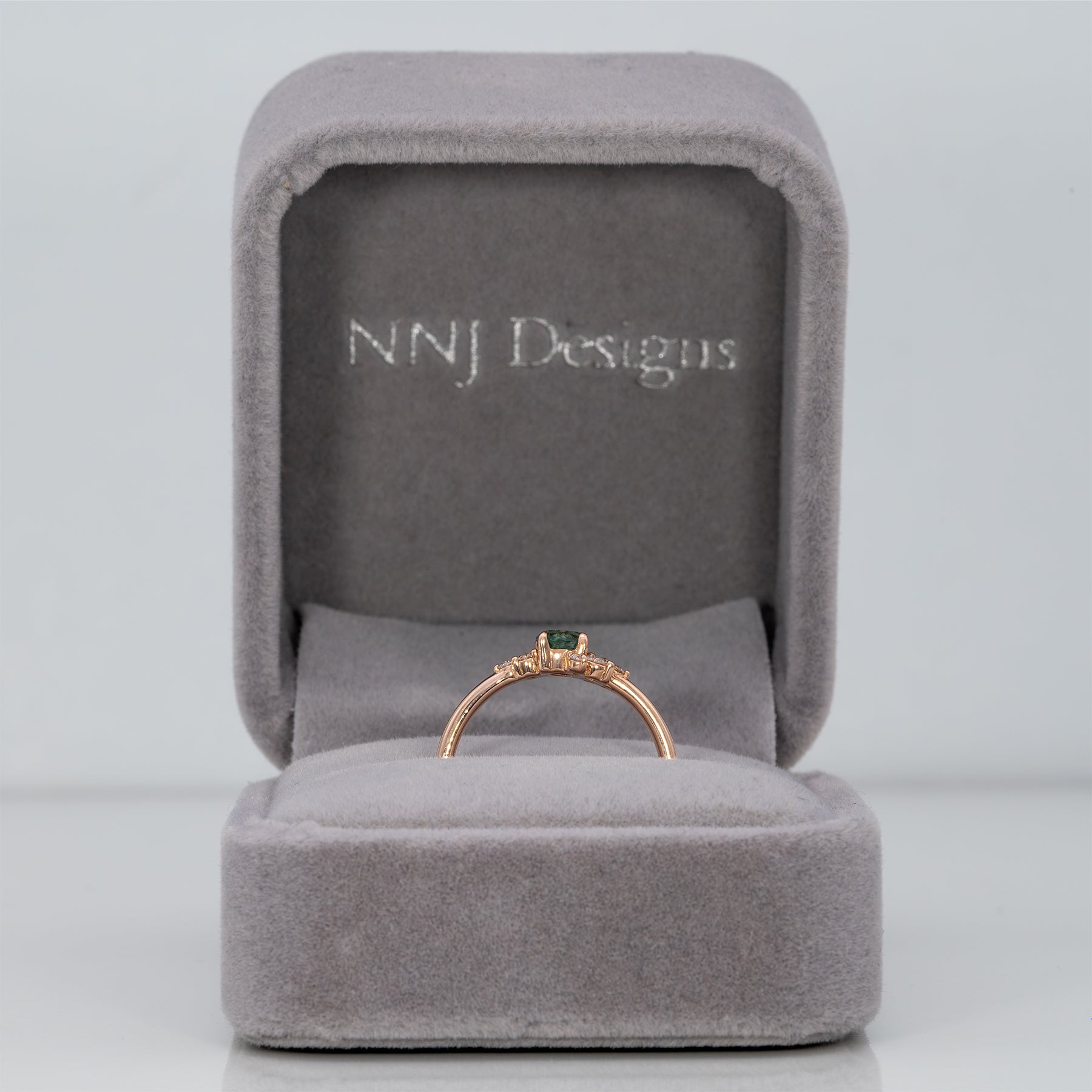 14K rose gold alexandrite ring with diamond accents