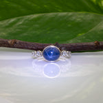 14K white gold blue star sapphire cabochon ring with diamonds