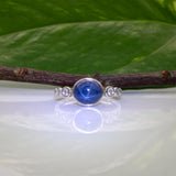 14K white gold blue star sapphire cabochon ring with diamonds