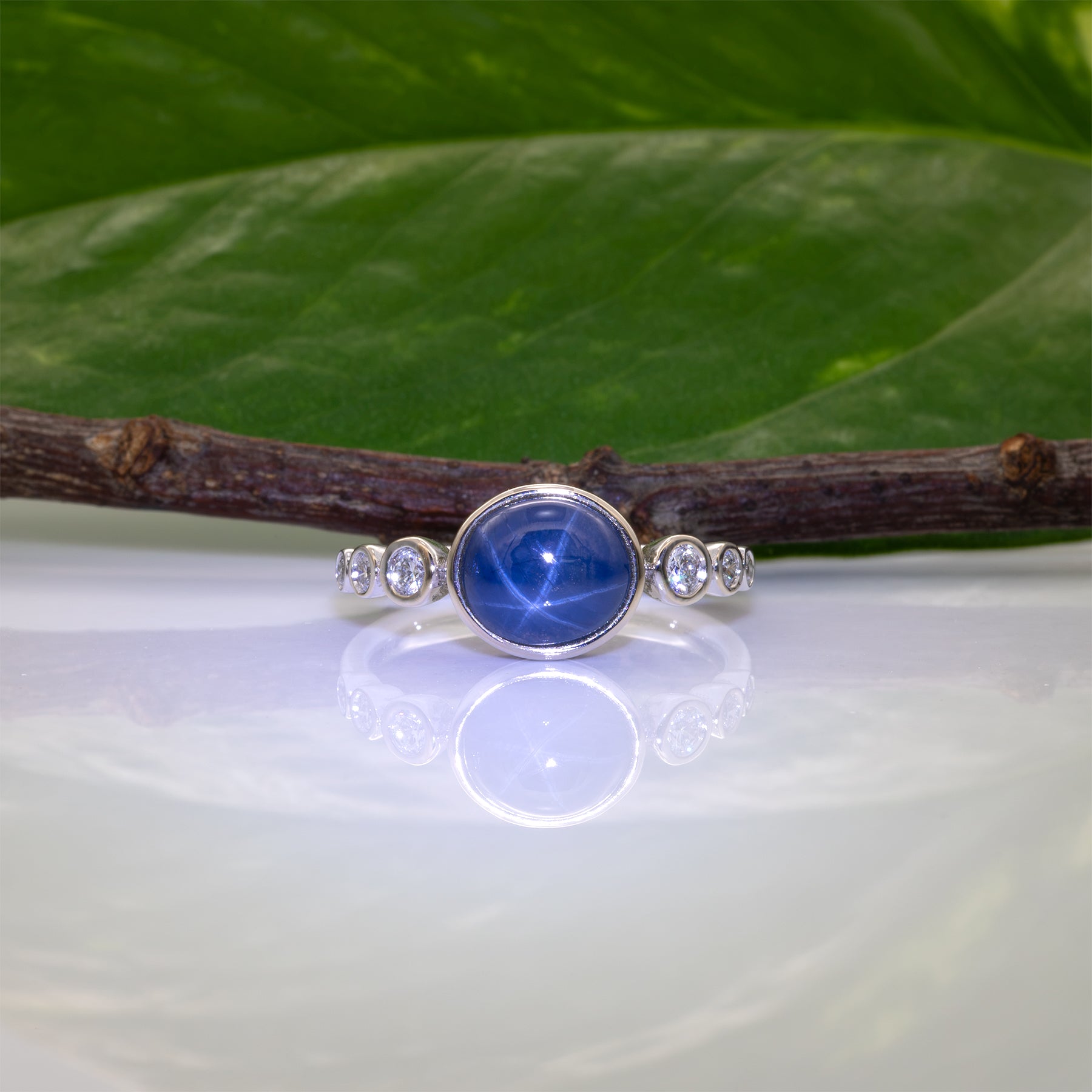 14K white gold blue star sapphire cabochon ring with diamonds