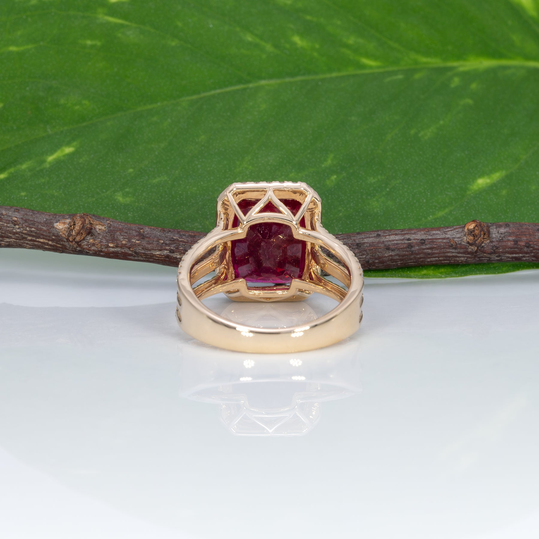 14K yellow gold Madagascar ruby ring with diamond halo