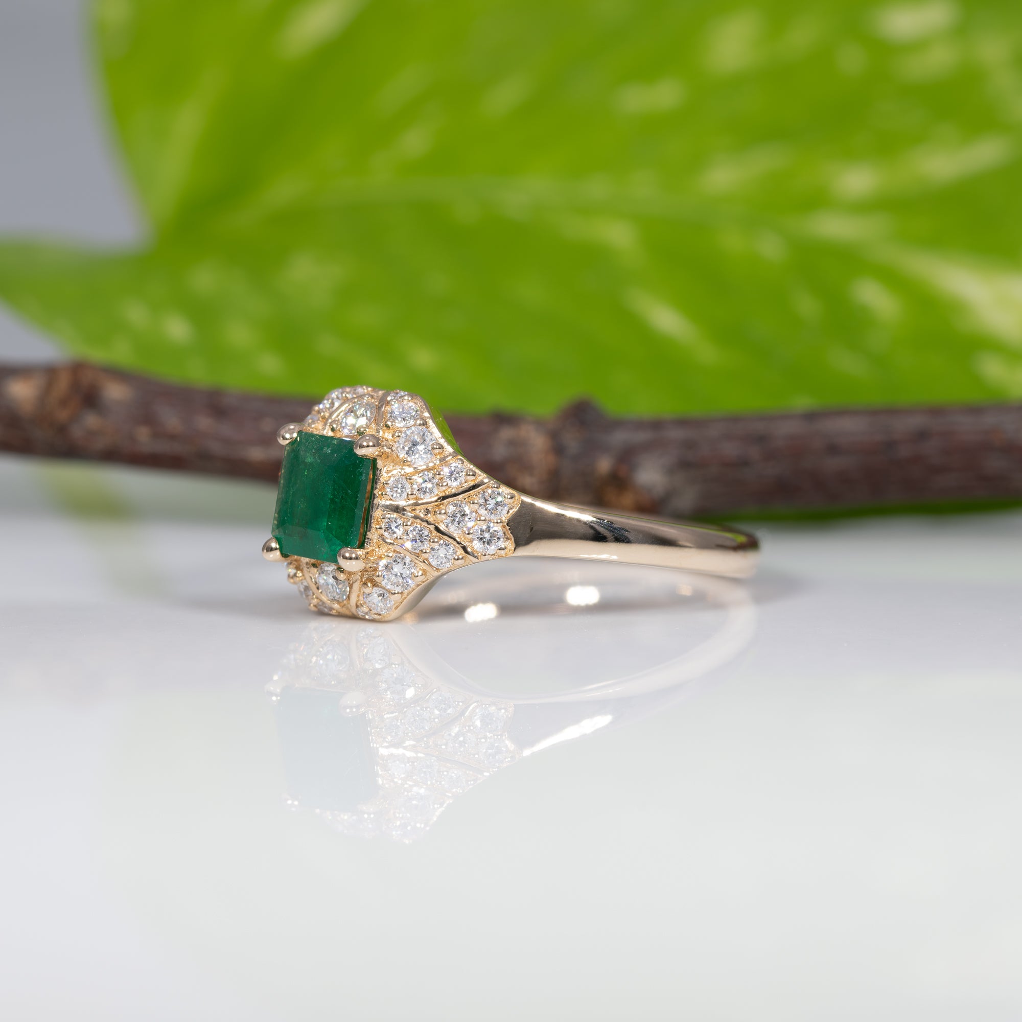 14K yellow gold Colombian emerald ring with diamond accents